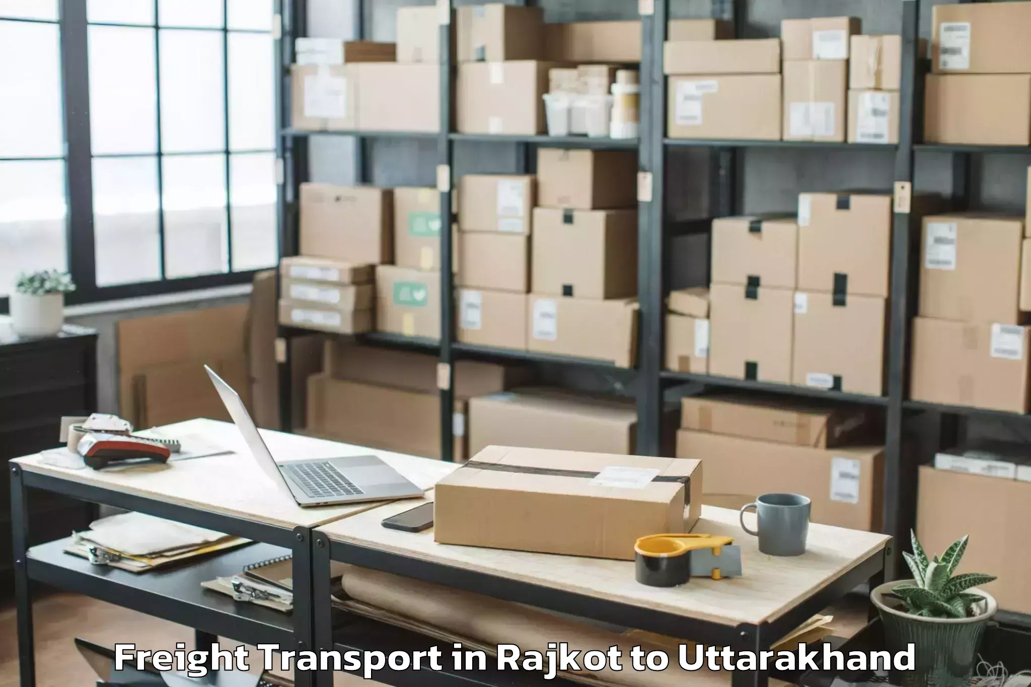 Book Rajkot to Graphic Era Hill University Cl Freight Transport Online